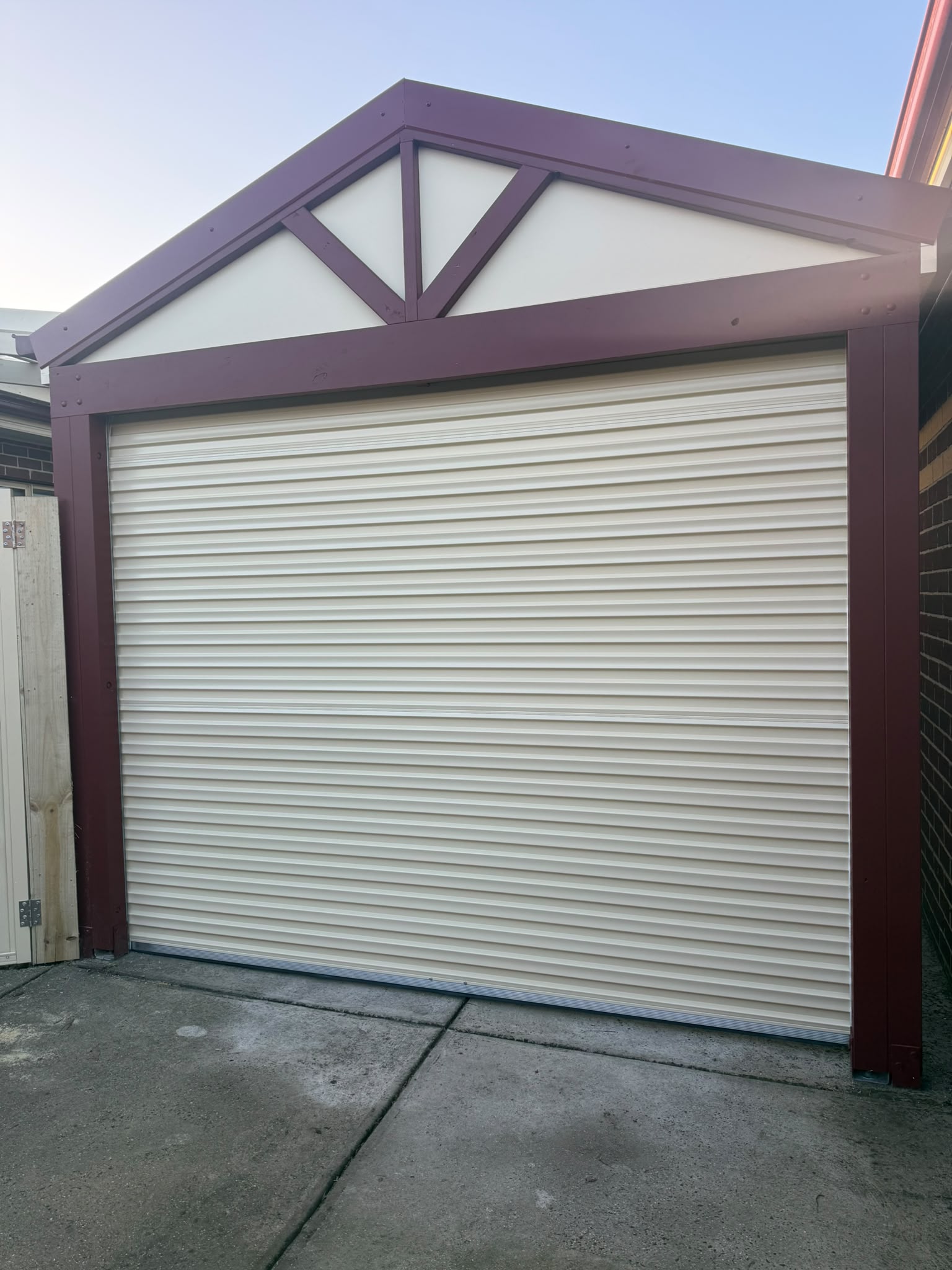 Newly installed garage door viewed from the driveway